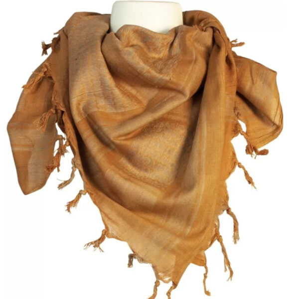 Coyote brown shemagh scarf with traditional fringe edges displayed on a mannequin